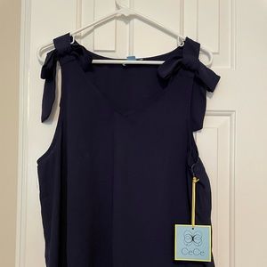NWT. Navy sleeveless bow blouse by CeCe.